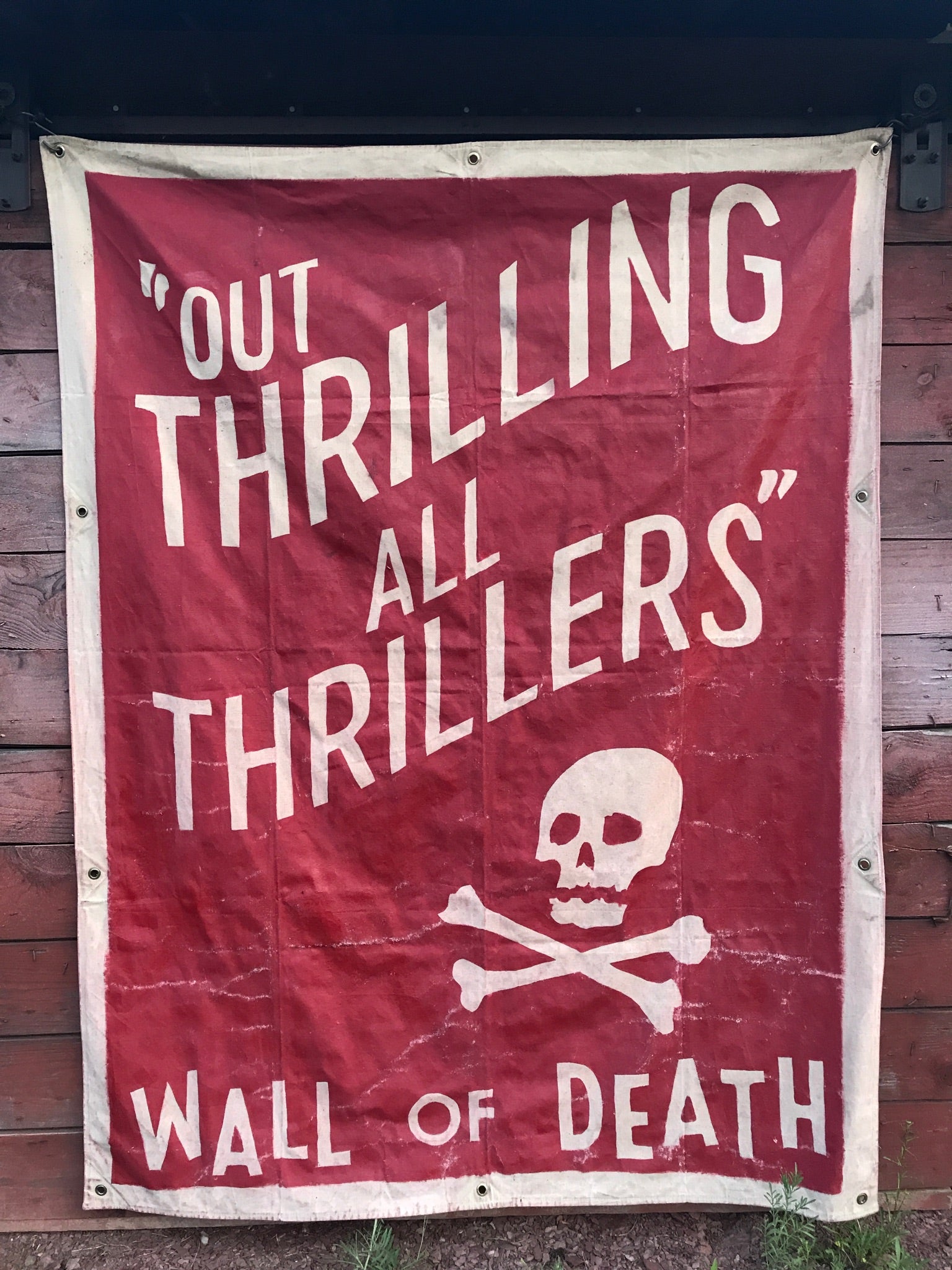 'Out Thrilling All Thrillers' hand painted canvas banner